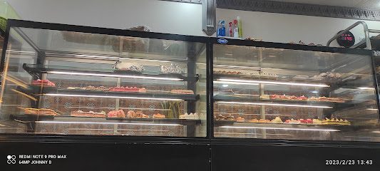 حلويات ومرطبات وبيتزيريا الطاسيلي